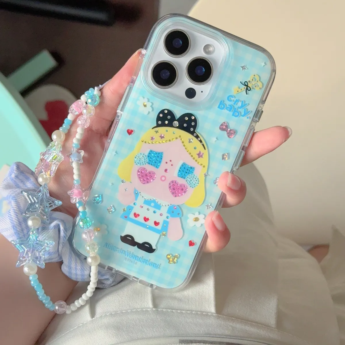 彩钻爱丽丝哭娃适用iphone16promax苹果15Pro手机壳新款14卡通防摔13手链保护套